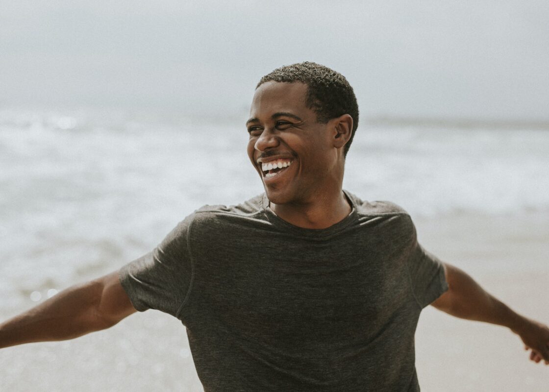 man-at-beach-smiling