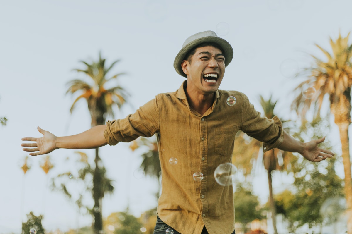 man-outdoors-smiling-Valiant-Living-Recovery