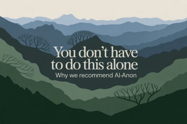Colorado mountain landscape graphic titled You Don’t Have to Do This Alone Why We Recommend Al-Anon, representing support for spouses of addicts and shared recovery perspective.