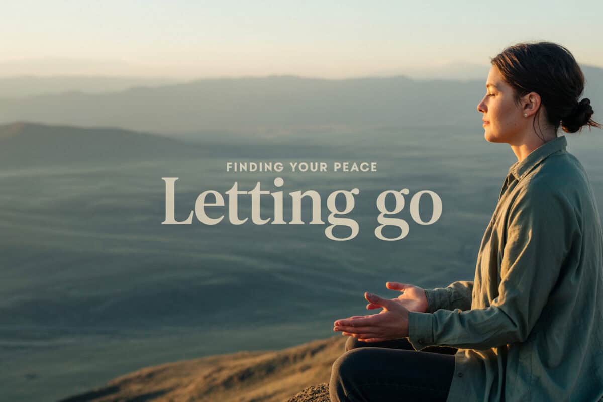 Woman meditating outdoors for peace and letting go recovery.